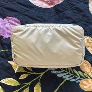 Beis Expandable Pouch / belt bag in Beige turns into backpack